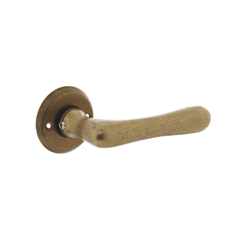 Door handle Trento round rosette brass tumbled