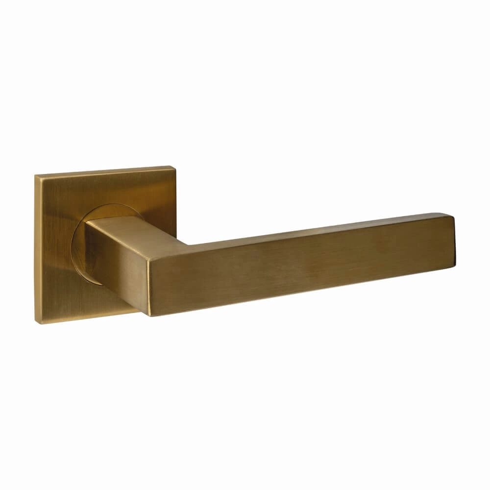 Door handle Q 05 on square rosette brass matt