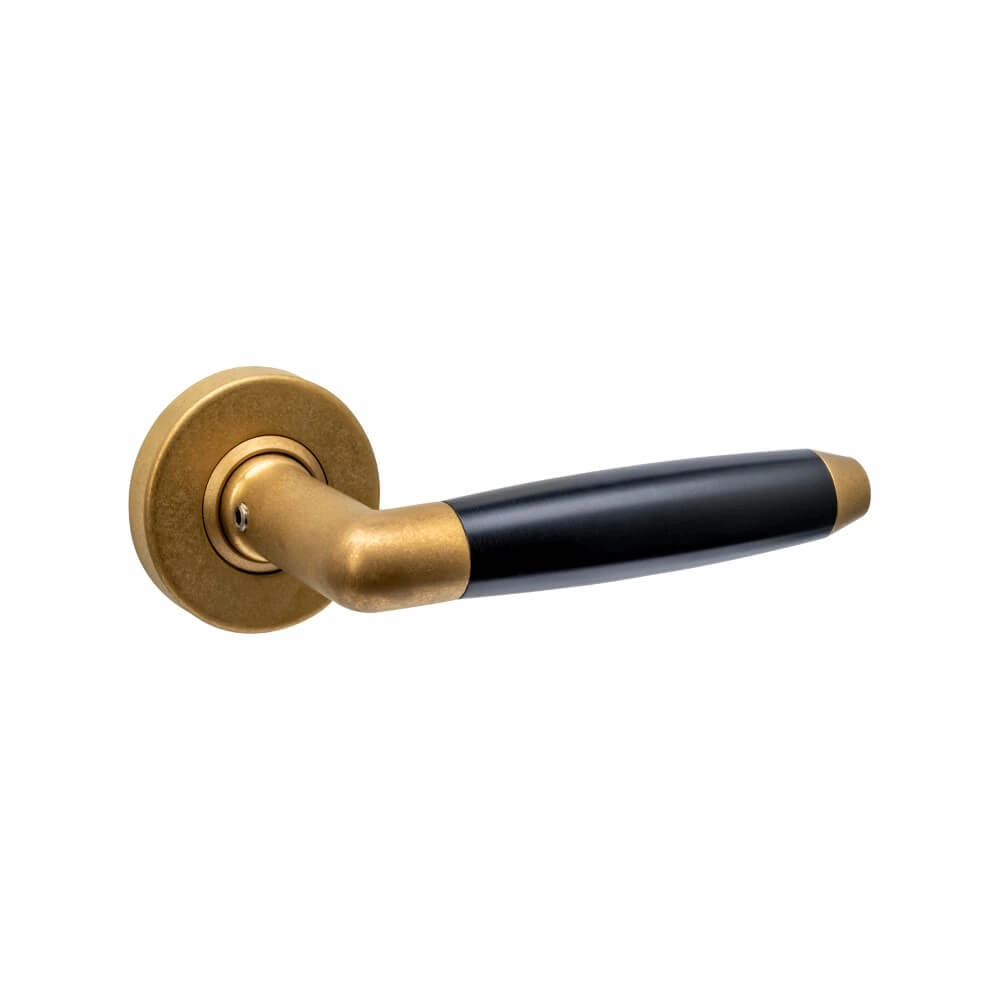Door handle Combinatie Tumbled round brass