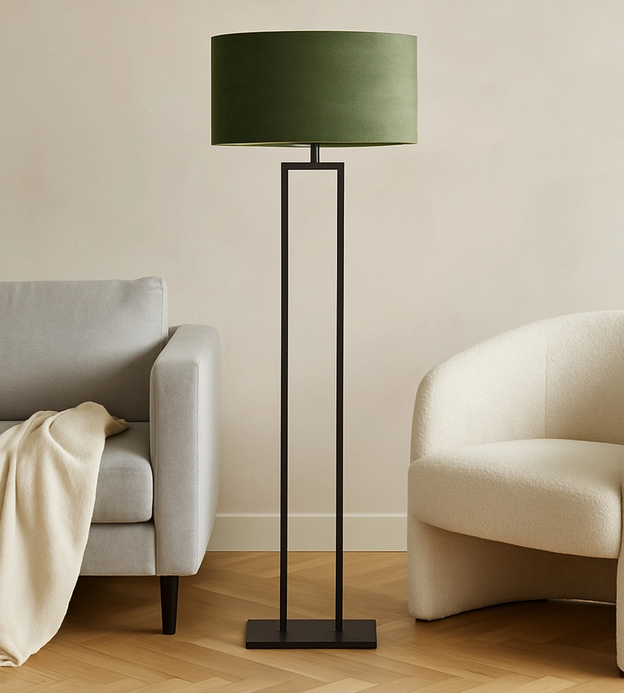 Black floor lamp with green shade at sofa and chair