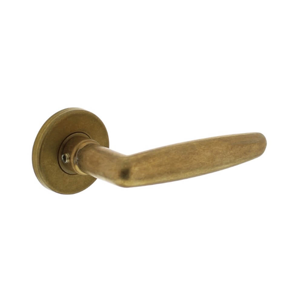 Door handle Sophie on rosette brass tumbled