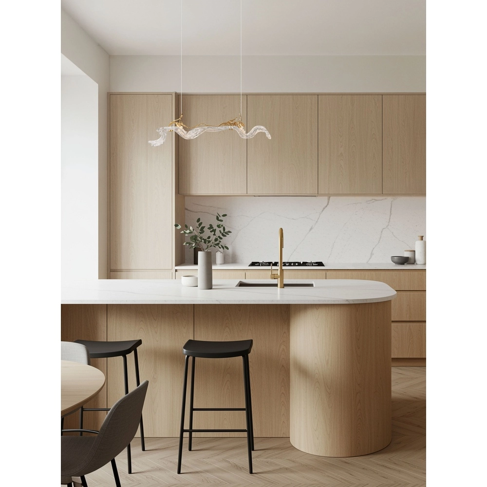 Golden pendant lamp Avesa with clear glass